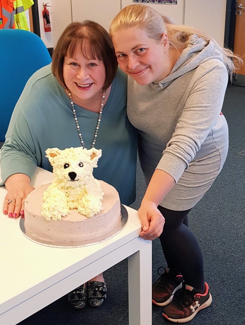 This amazing cake has been made by Monika Zielinska, Care Shop Warehouse Administrator for our MD Barbara Meeks. Its a thing of beauty -the top tier being a West highland Terrier, of which Barbara has two! We don't think the cake will last very long!! #warehouse #amazing #tasty