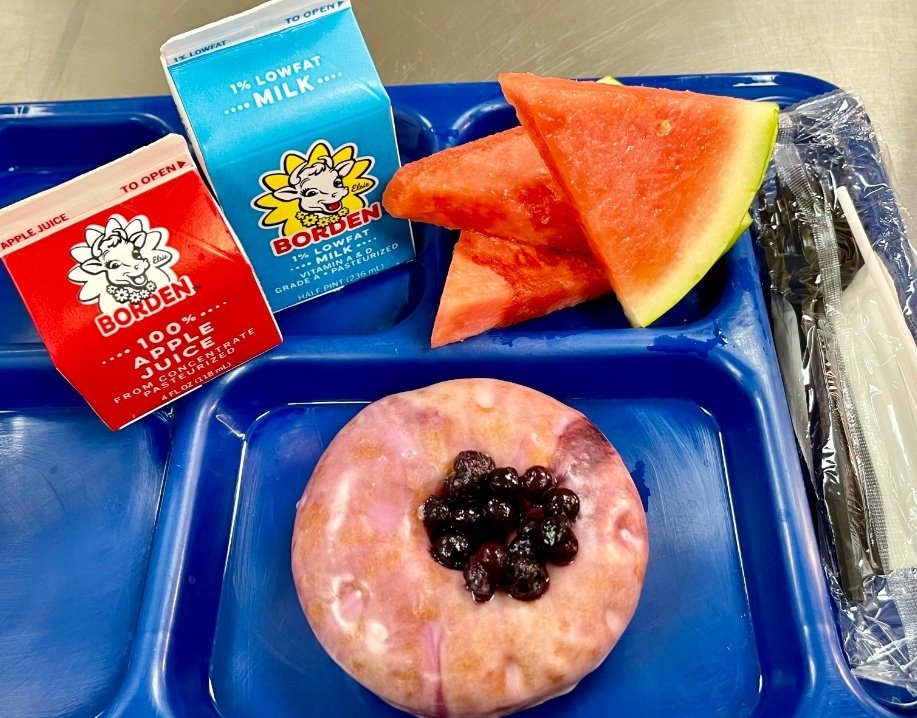 BurlesonCNS's tweet photo. Donut be blue, it's #FriYay. Tasty blueberry🫐donuts featured at @CafeClinkscale &amp; our #HarvestoftheMonth is watermelon🍉 #freshfruit is  offered daily at all our campuses. Have a great day @BurlesonISD 😃 https://t.co/QSOZGh9Yap