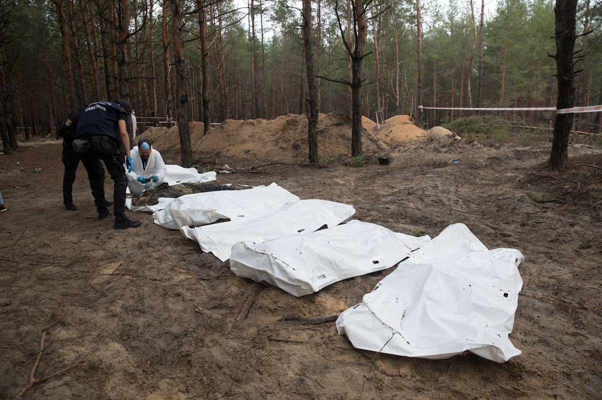 InnaSovsun's tweet photo. These people were alive. And then russians came.

We need Tribunal on russia's war crimes! https://t.co/MebD1wEbOp