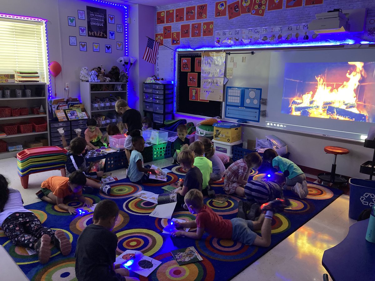 Storytellers153's tweet photo. I love flashlight Fridays for read to self time. ⁦@GuffeyElem⁩ https://t.co/sJGvVK7icr