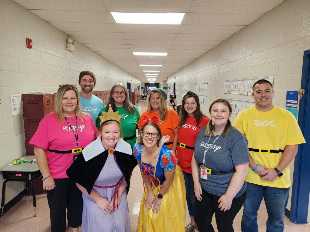 Reading In Schools Day brought to you by The Evil Queen, Snow White and the seven dwarves.