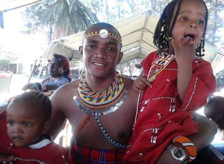 President Ruto's Aide de Camp, Brigadier Timothy Lekolool, in traditional Samburu attire, with his children.