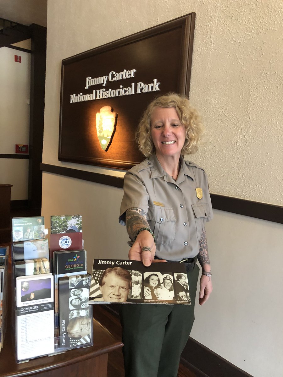 JimmyCarterNPS's tweet photo. Stop by our Visitor Center at Plain High School! Ranger Holly has brochures for our park and surround attractions! Image Description: A Park Ranger holding a Jimmy Carter Brochure. #FindYouPark #JimmyCarter #SumterCo #Georgia https://t.co/H9scAQpJVQ