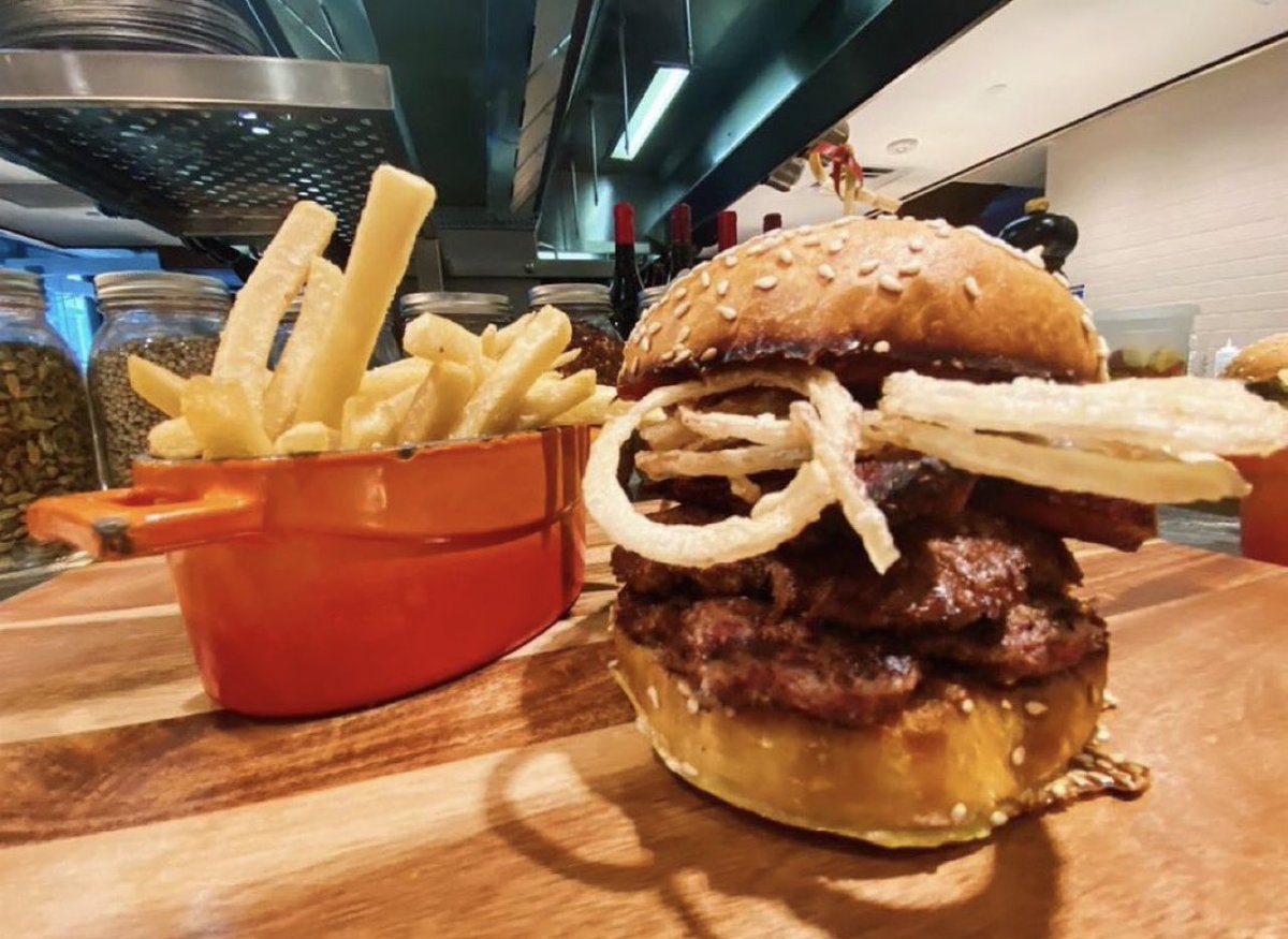 Fried onion strings are good. But onion strings on a double stacked bacon cheese burger? 🤤 
Order our Smokin Gee today from your favorite app or pick one up from @whiskeydiner this week!