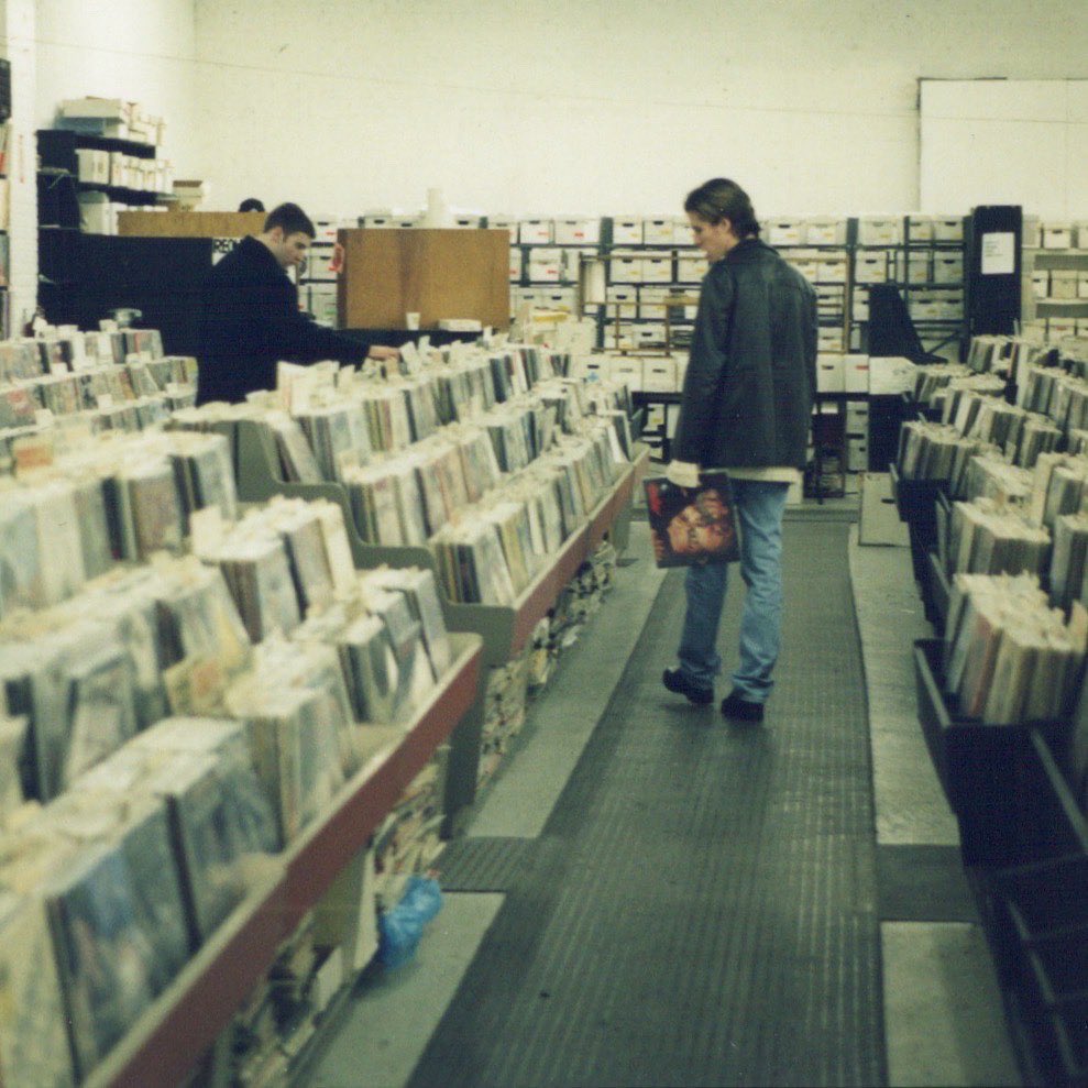 KevinBurke20's tweet photo. Here’s an old pic of me shopping at Jerry’s Used Records in Pittsburgh. One record I’m definitely not buying in this picture is Steely Dan’s “Aja” - a record I’ve never heard in my life until this week. Did I love it? Hate it? Listen and find out! https://t.co/n6NMNZh3jS https://t.co/X7NPi1dJl3