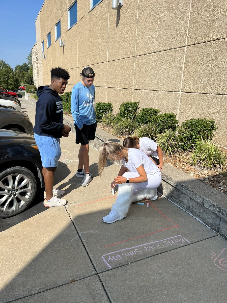 Great kids + beautiful weather + Homecoming Week = marketing class outside learning about economic activities with sidewalk chalk! <a href="/StDominicHS/">St. Dominic High School</a>