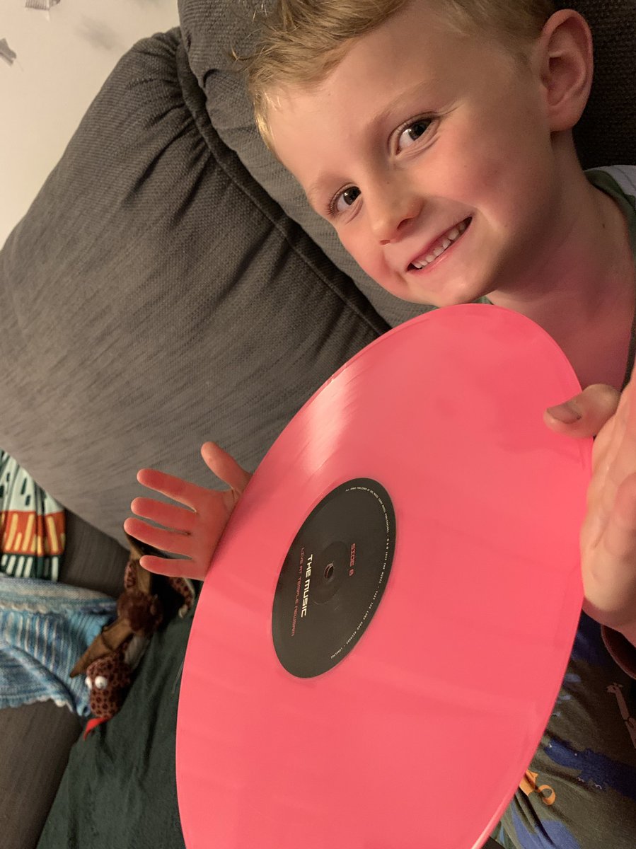 GVeryard's tweet photo. It arrived! My son (5) said that (gig) looks ‘dangerous’ 😂 He loved the pink vinyl, and poster, (#044) not as much as his ol’ man though 🤤 Fucking quality having a vinyl of that day. Are the signatures left to right, Adam, Phil, Rob then Stu!? @nutter_adam ?@TheMusicTour ❤️✌️💥 https://t.co/nC5zQxi4Zj