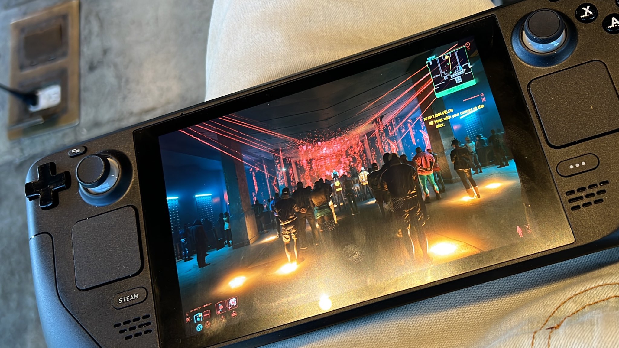 2 pic. Playing @CyberpunkGame on a SteamDeck is the most Cyberpunk way you can play Cyberpunk lol! Thanks @CDPROJEKTRED for cloud saves I just continued my game on the go from my Series X 🙌👀 https://t.co/KLjKqqDztJ