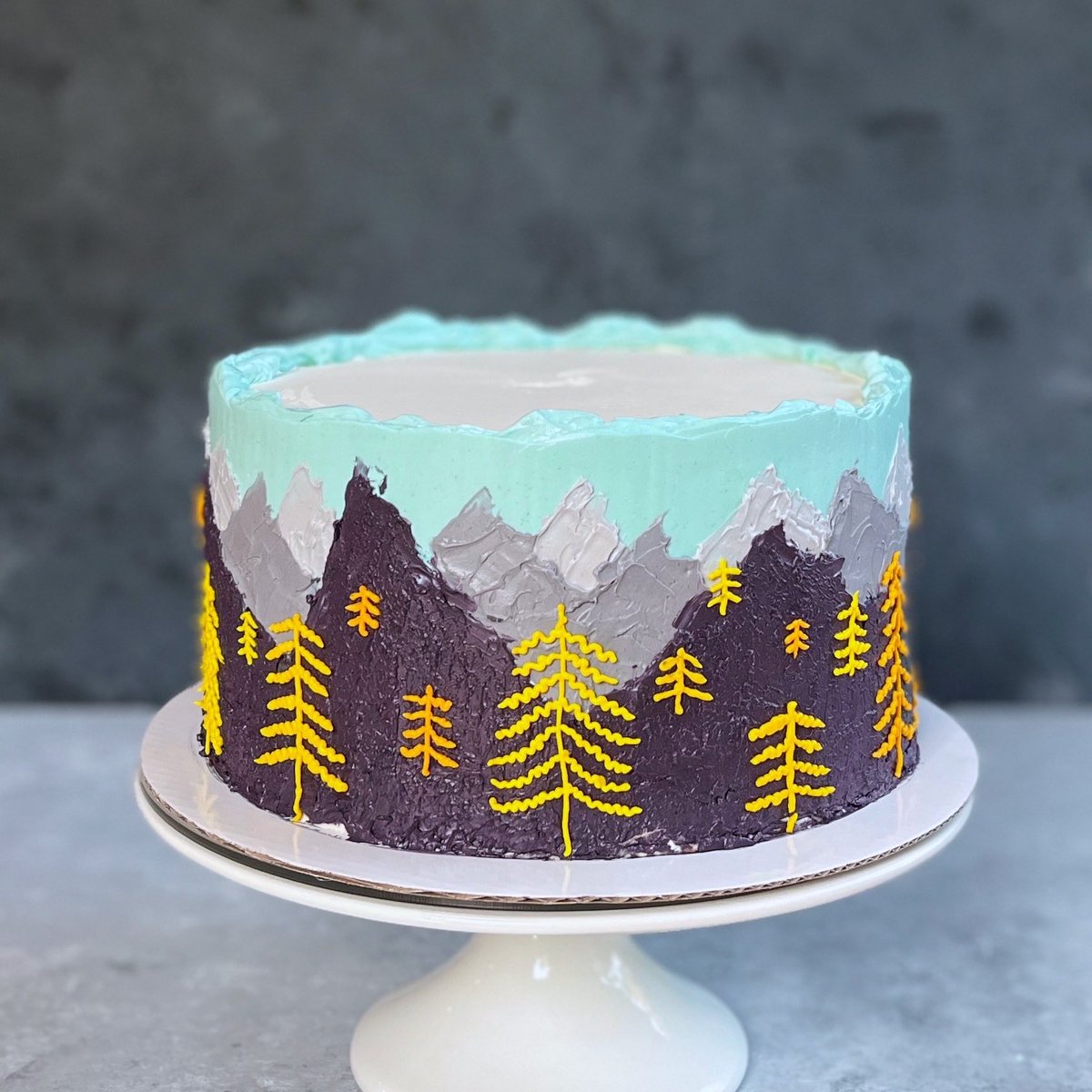 A duo of autumn cakes for a friend who is moving and will miss Seattle’s fall colors this year. Spice cake, bourbon syrup, apple butter filling, and ginger-bourbon Swiss meringue buttercream. 

Did I repeat “happy little trees” to myself as I was piping the larches? I sure did!