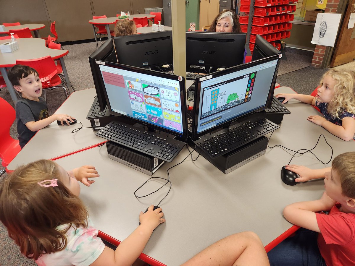 Too busy teaching instead of be a photographer so only 1 picture but PreK working on mouse skills while coloring online.  1 face says it all.