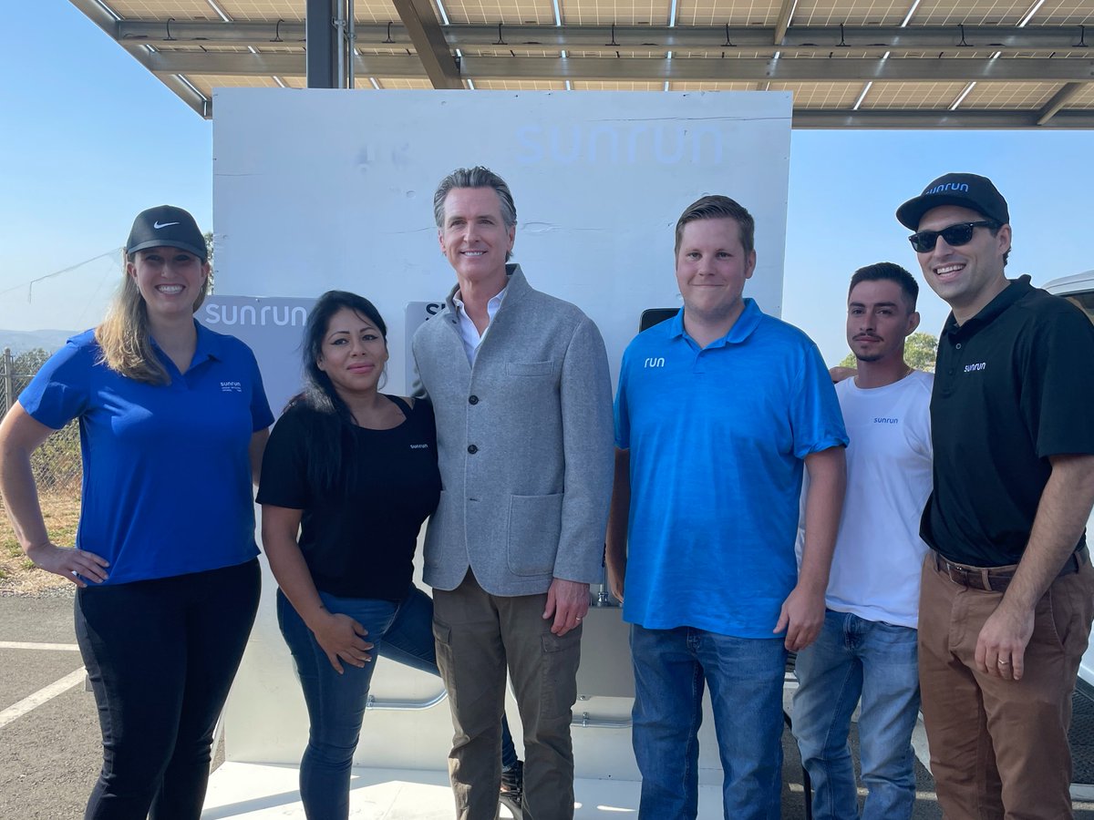 Sunrun's tweet photo. Sunrun was proud to stand with @GavinNewsom under distributed #solarpanels and in front of advanced clean technologies at the signing of #SB1137 as California looks to lead the nation on #climateaction. @SenGonzalez33 @Scott_Wiener @CAgovernor @SenSusanEggman @Ford @EnvCalifornia https://t.co/FwisDHk4TH