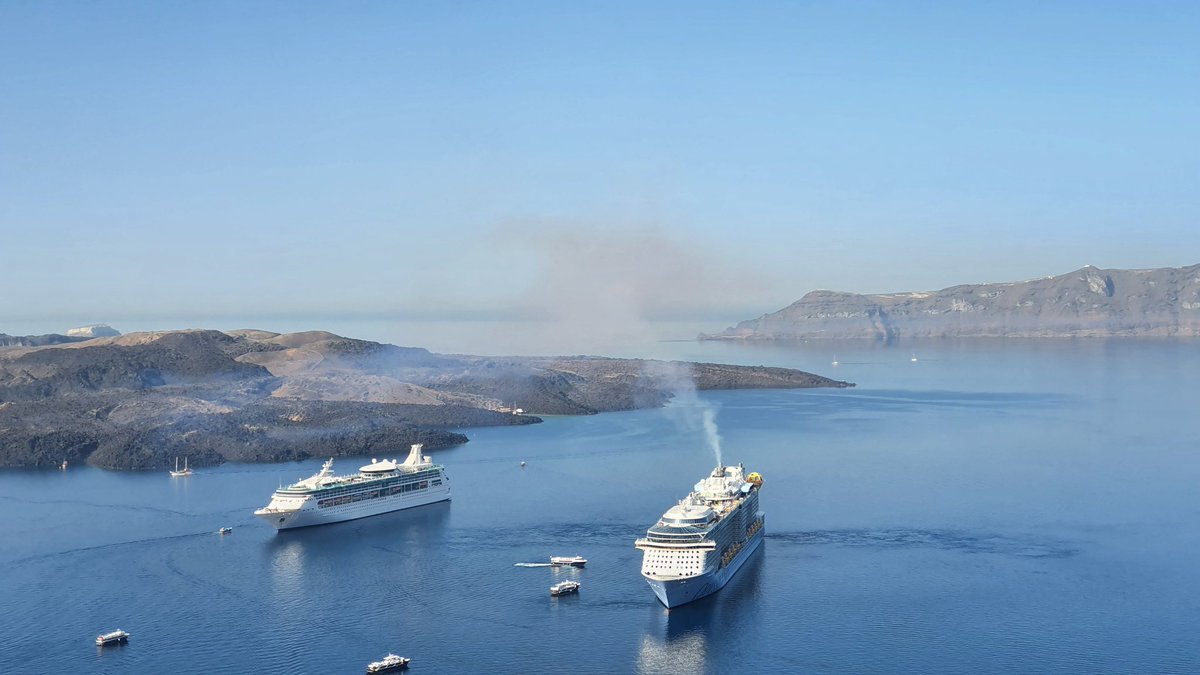 XimEnWonderland's tweet photo. Like many, I was enjoying the ocean air and view in Santorini.. and then this monstrosity Cruisliner arrived. In 1hr the whole area has been filled with it's chimney exhaust!!! shame on you #oddisseyoftheseas #royalcaribbeaninternational #cruiseship https://t.co/fYZio0IWXm