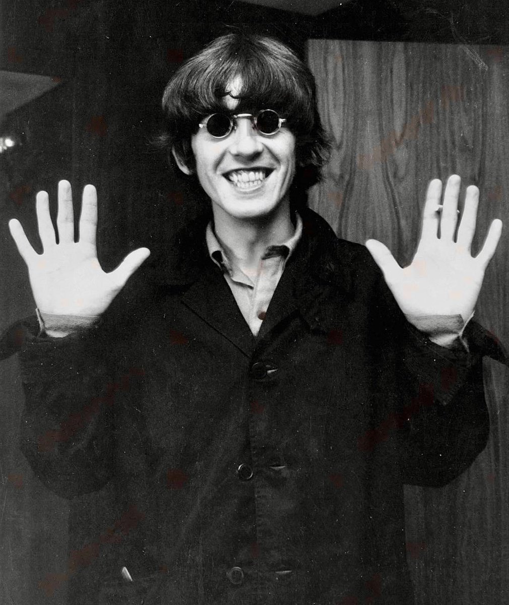 George Harrison, having a splendid time in Japan, 1966.