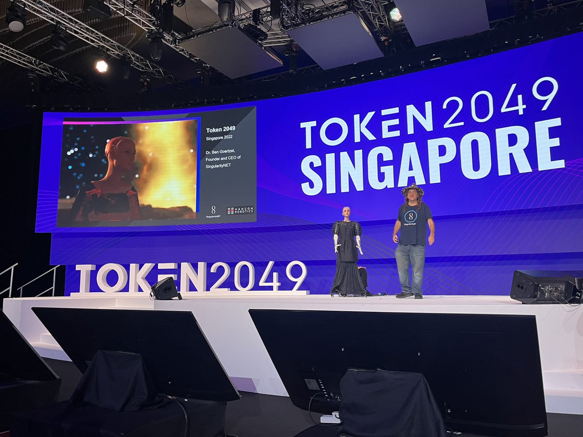 token2049's tweet photo. Happening now:

@bengoertzel and @RealSophiaRobot talk about AI, Blockchain, and Metaverse: Challenges and Synergies on Stage 1 at #TOKEN2049 Singapore. https://t.co/9OQoNjhPUo