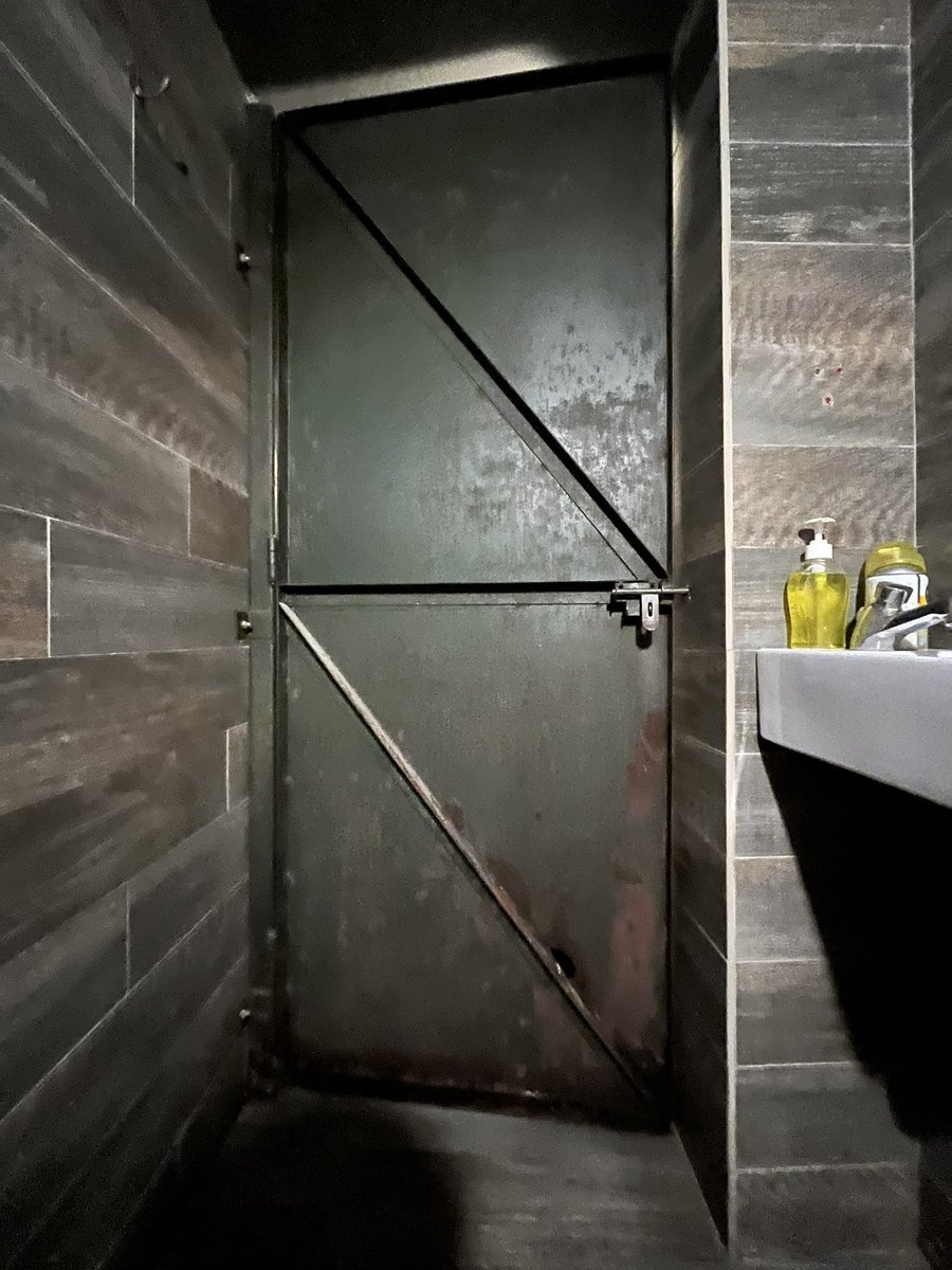 n3ckchong's tweet photo. My biggest fear in life has become getting trapped in bar bathrooms that close fully

So you’re telling me that there isn’t a non zero chance this rusty door’s hinge breaks and I’m trapped in here forever? https://t.co/cixZ6a8i9G