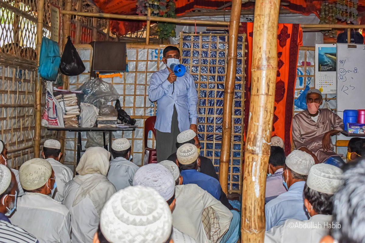 Abdulla_AH7's tweet photo. Exectly last year today, #Rohingya leader #Muhibullah was assassinated at his office in the camp.We are still mourning the lose of a brave leader in the ground level.He used to says,''If i die, its fine''.
I took these photo while he was giving covid-19 awarness at his office. https://t.co/aG4QQg9s1E