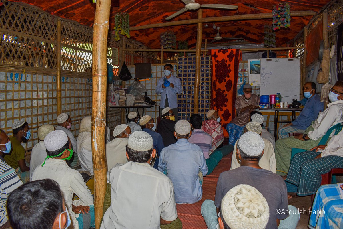 Abdulla_AH7's tweet photo. Exectly last year today, #Rohingya leader #Muhibullah was assassinated at his office in the camp.We are still mourning the lose of a brave leader in the ground level.He used to says,''If i die, its fine''.
I took these photo while he was giving covid-19 awarness at his office. https://t.co/aG4QQg9s1E