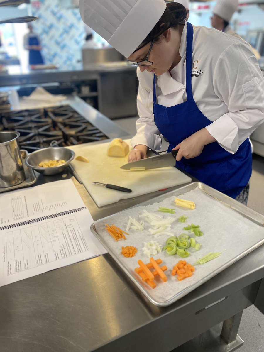 Sarah68212695's tweet photo. Culinary students are learning knife skills in the kitchen today. Looks like art to me! @DualCreditatCC @SJBGuelph https://t.co/U0iLdP9qzs