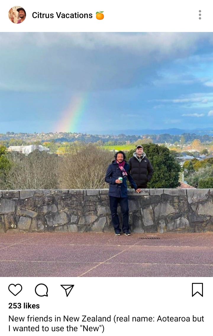 Roach's IG: Picture of Roach and Lucius standing at a wall under a rainbow. Caption: New friends in New Zealand (real name: Aotearoa but I wanted to use the "New")