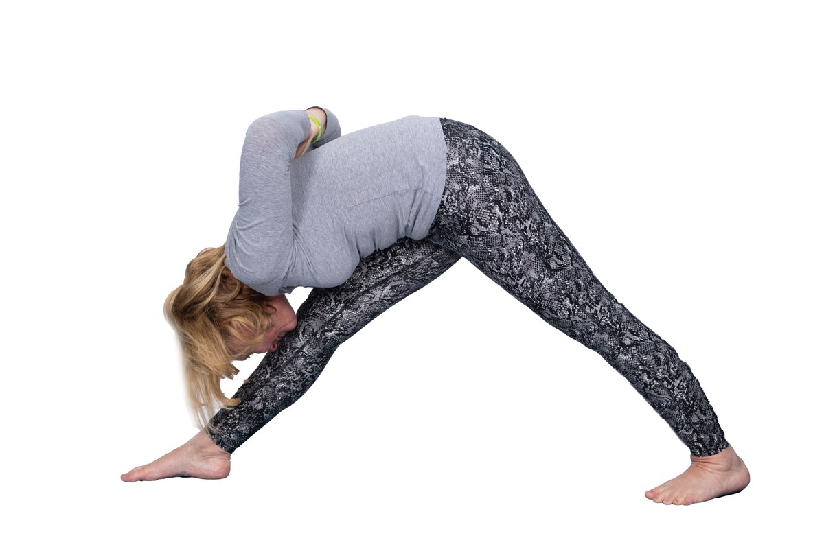 Parsvottanasana
~Relieves stiffness in the legs and hip muscles
~The abdominal organs are contracted and toned
~Wrists move freely and any stiffness there disappears
~Round/drooping shoulders are corrected
~Drawing the shoulders well back makes deep breathing easier