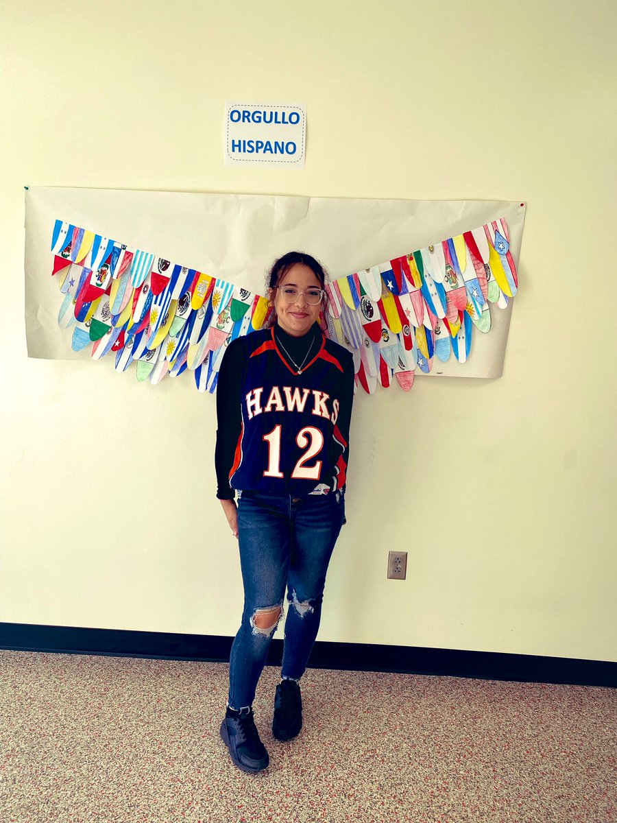 Ms. Smull’s Heritage class created this wing mural using feathers they created based on different country flags! #EngageOE #worldlanguage