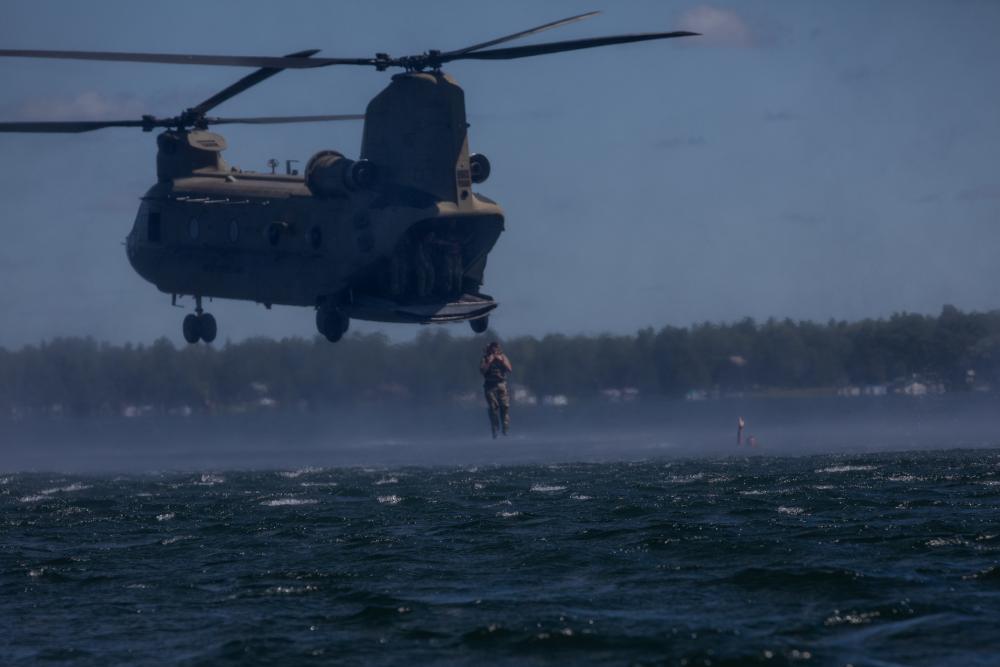 SOFWERX's tweet photo. Warfighters from 20th Special Forces Group (Airborne) at Camp Grayling, Michigan practice for a helocast exercise during Northern Strike 22.
 #20SFG #NorthernStrike #helocast #training #support #airborne #SOFWERX #SpecialOperationsForces https://t.co/Al5dp8aKfY