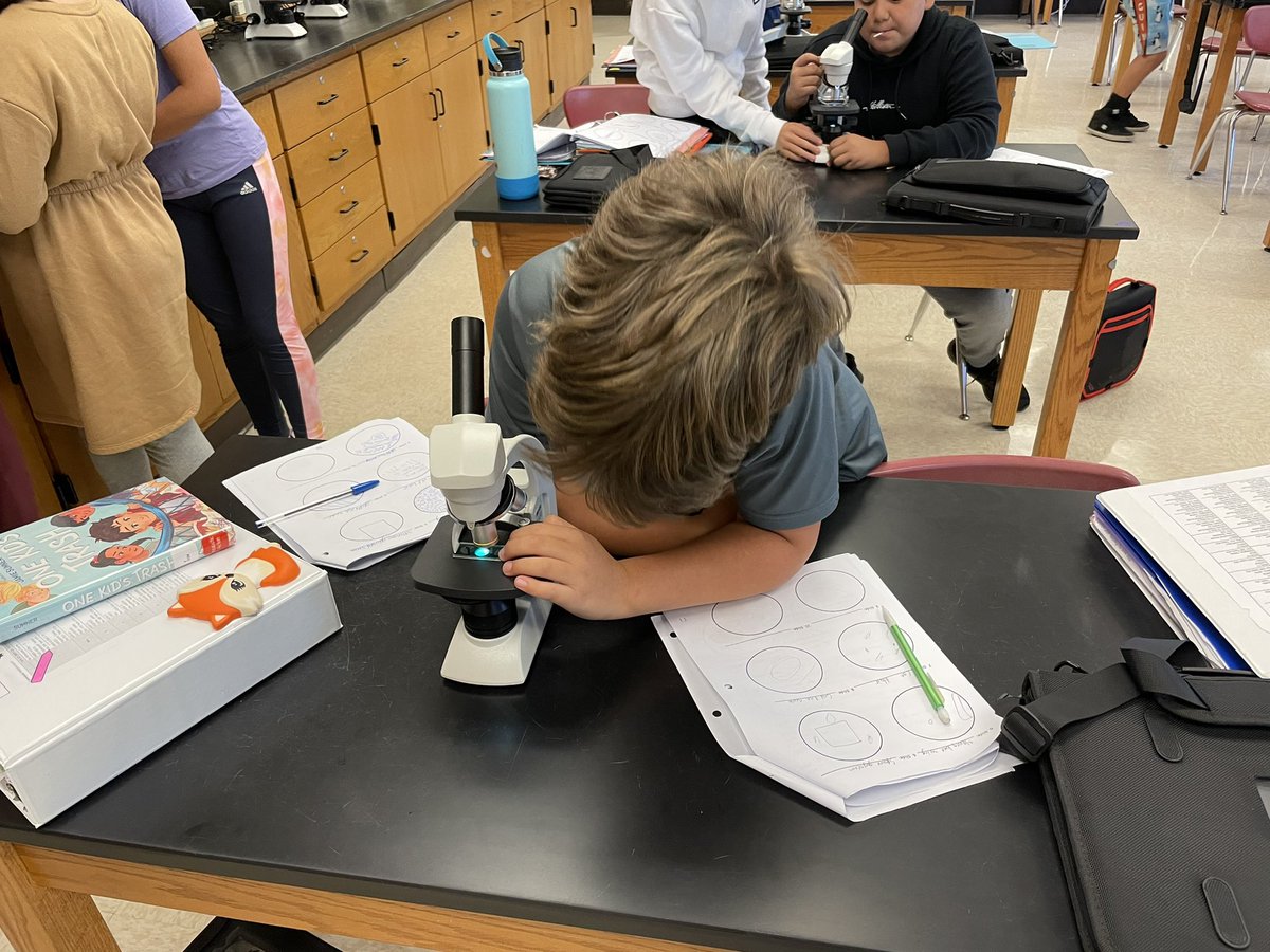 Jamiecarlino's tweet photo. These 6th grade scientists are becoming pros at using the microscope!!  #isliprising #islippride @IslipMS https://t.co/0FGwrClsnr