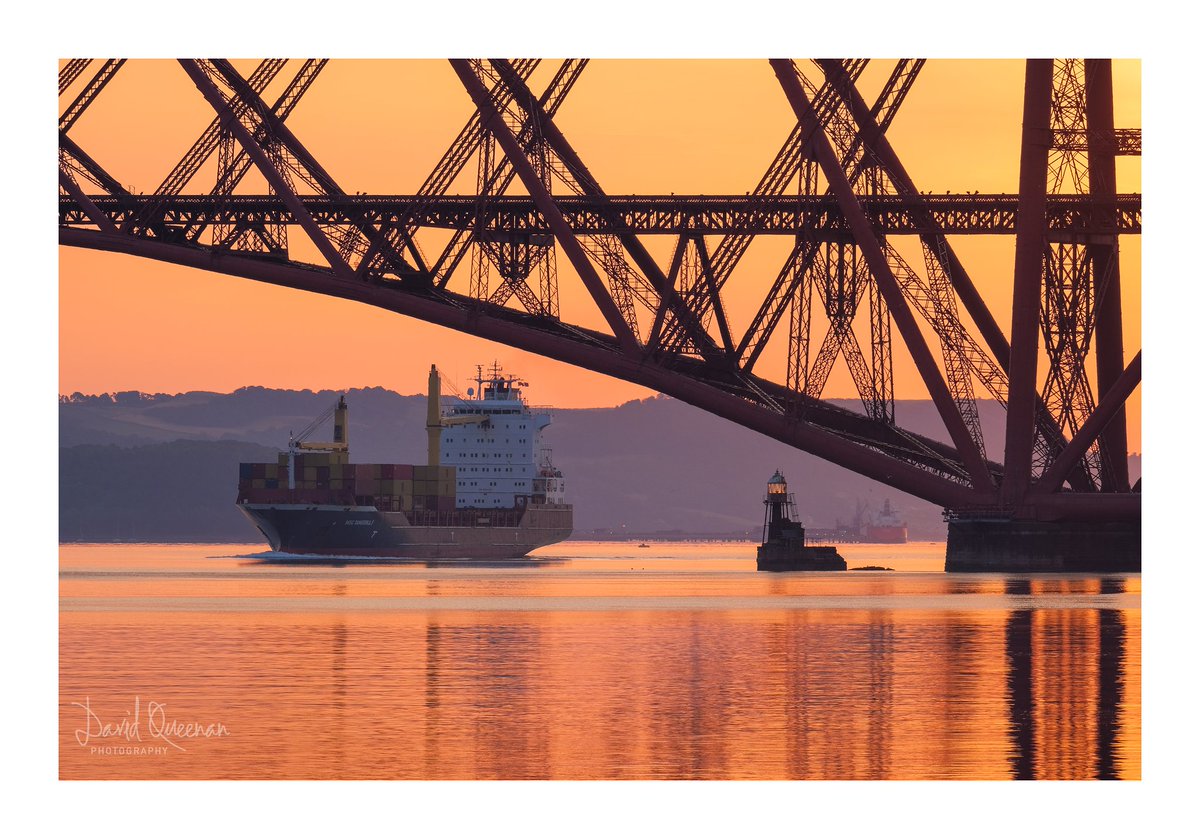 GOING UNDER: A large container ship making it's way up the Forth to Grangemouth at sunrise. #appicoftheweek @FujifilmUK @ForthBridges @welcometofife @3LeggedThing @fujilovemag #10yearsofxmount