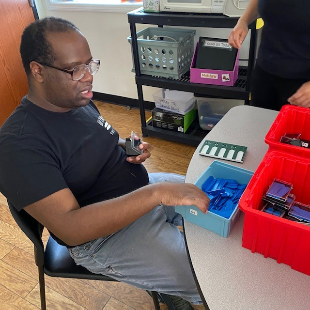 AndersonAutism's tweet photo. Adults at Saugerties LLLC maintain their foundational skills by working on pre-voc tasks. These skills are then generalized to vocational programs like Organic Outcomes, Adaptive Design, pizza box folding, the Day Hab Dollar Tree, and more! #AdultProgram #PreVoc #Autism #1in44 https://t.co/XEXq3VrF6v