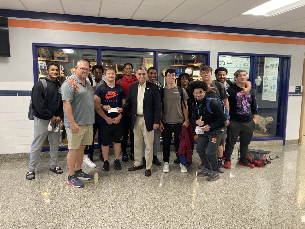 I presented the Solvay Football team with a check as a thank you for helping at the Shredding Event in September. The team helped shred and recycle 23,280 lbs  of paper.