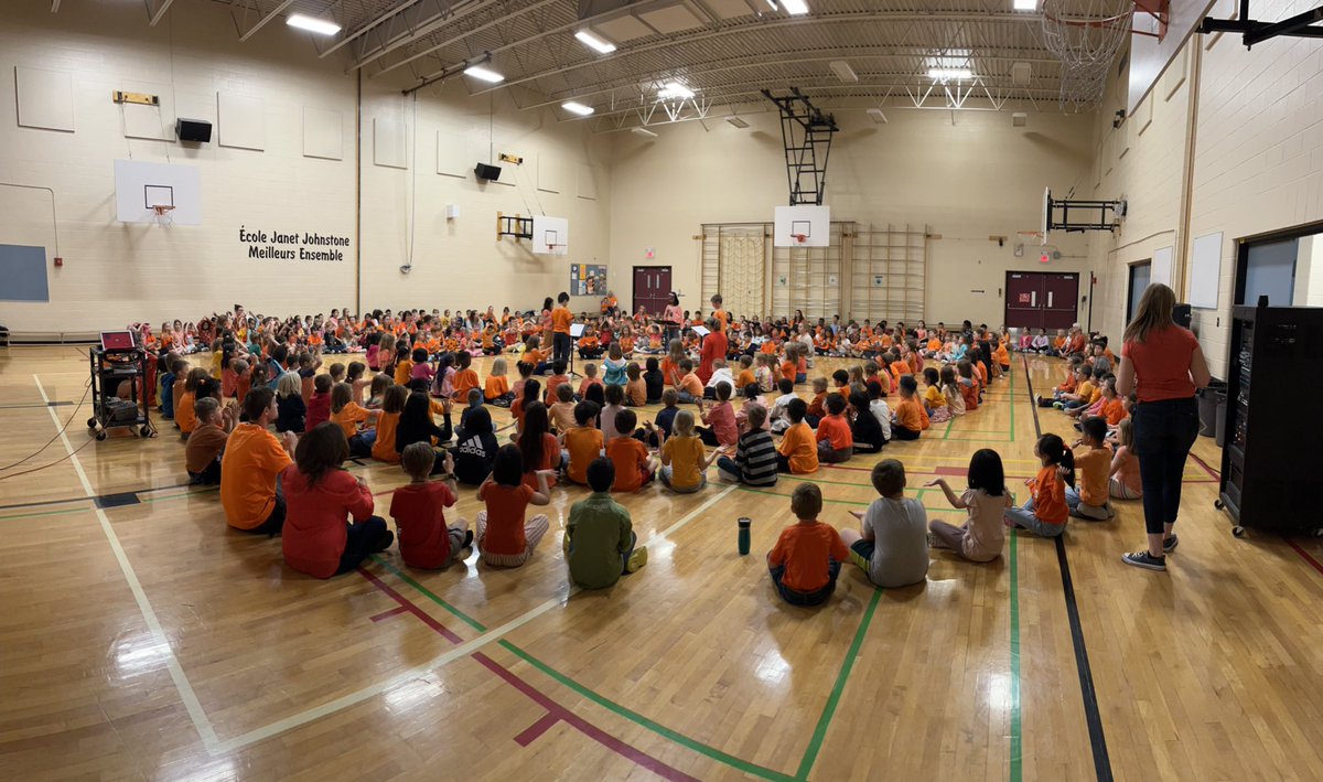 JohnstoneSchool's tweet photo. Orange shirt day assembly with a focus on belonging 🧡 #OrangeShirtDay #belonging #CBE https://t.co/X3D0d0aCjz