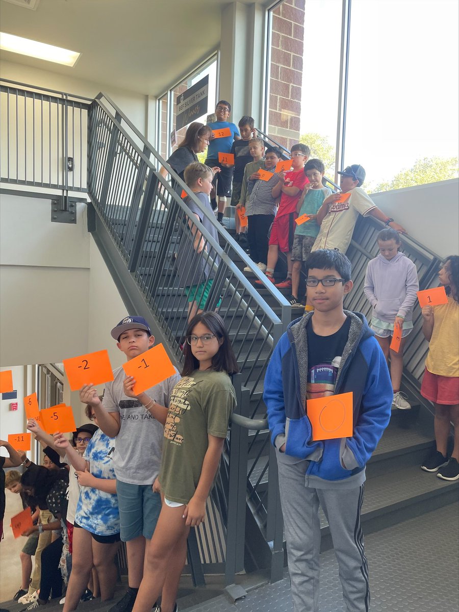 BoerneMSSouth's tweet photo. Human number line on our stairway #findtheopposite #absolutevalues #bmss #welovemath #boerneisd https://t.co/tSkIJedAbO