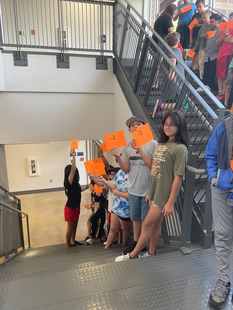 BoerneMSSouth's tweet photo. Human number line on our stairway #findtheopposite #absolutevalues #bmss #welovemath #boerneisd https://t.co/tSkIJedAbO