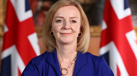 FakeShowbizNews's tweet photo. Liz Truss branded “clueless” after suggesting during BBC Radio Wolverhampton interview that cash-strapped families could collect conkers and sell them from a little stall outside their house https://t.co/WsWLIk3gW1