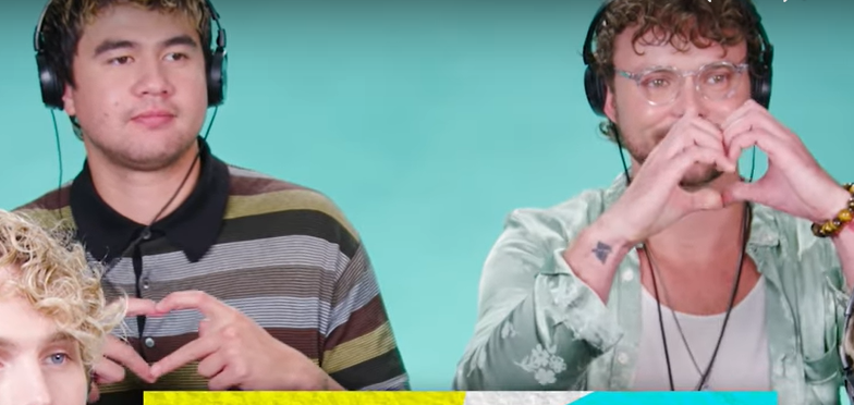 mylostnovelty's tweet image. calum doing the genz heart and ashton doing the millennial one makes me giggle