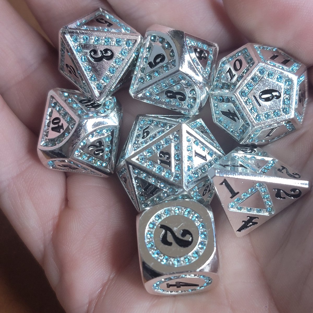 ModernArtifice's tweet photo. Queens Jewels Dice Giveaway! 
Rules: 
1. Follow Us
2. Share this post.
3. Tag a Noble
#diceset #dice #dnd #onednd #dnd5e #pathfinder #metaldice #gemstone #shiny #gem #giveaway #royalty #king #queen https://t.co/ImtP2uAMsJ