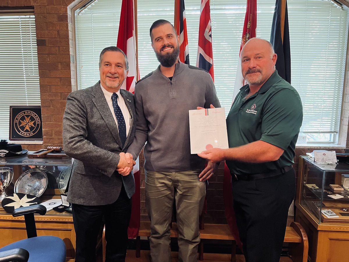 #SJASWO Director Raf Schubert (centre) receives the #SJA Lifesaving Award from Board Chair Don Denne (R). Raf came to the aid of Past Chair Philippe Morin (L) who was choking and unable to breathe, during a lunch break in #ldnont on March 8th this year. #SavingLives