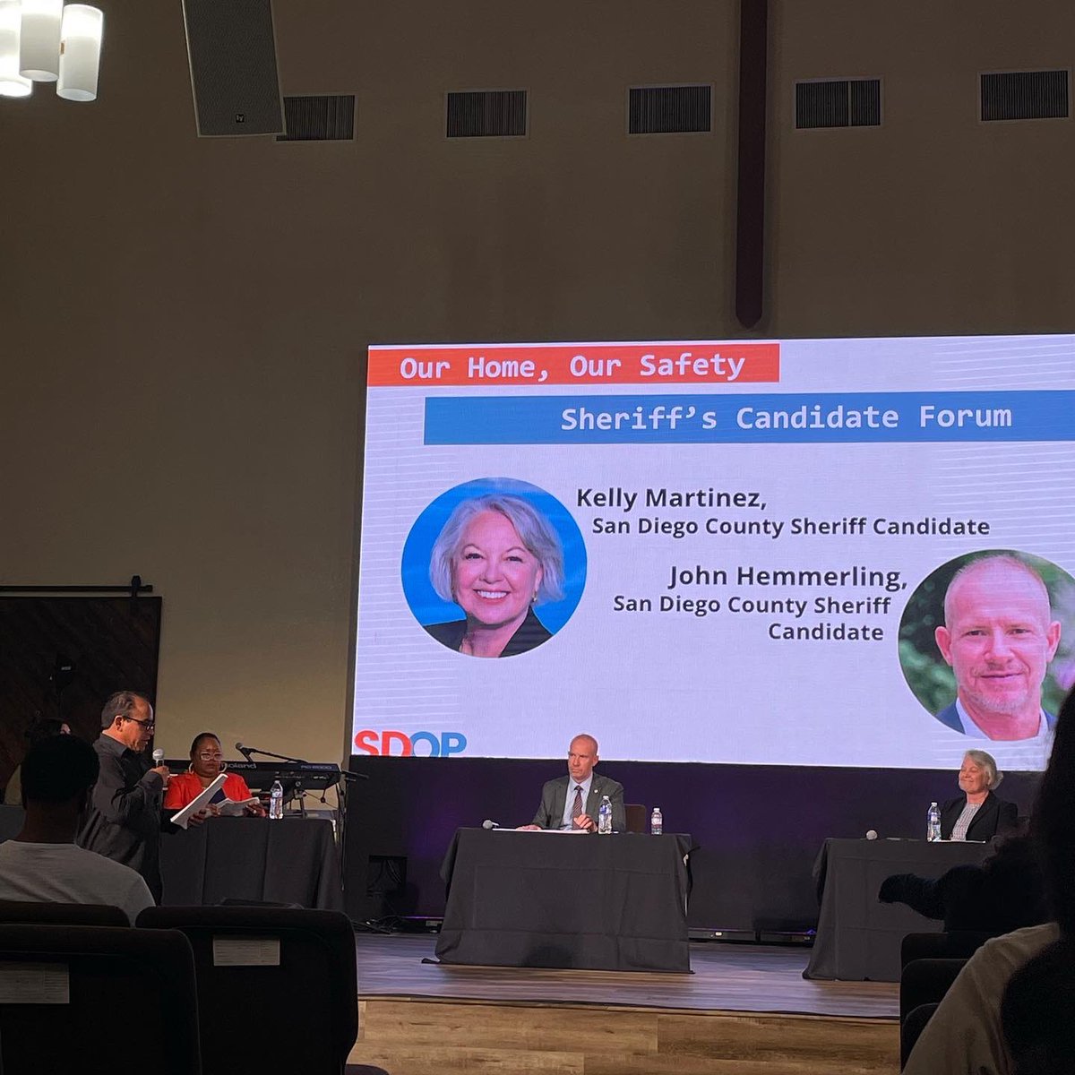 SDOPorganizing's tweet photo. Nearly 150 community members showed up last night to witness the San Diego Sheriff Candidate Forum. The candidates, Kelly Martinez and John Hemmerling, were asked questions that the SDOP community deemed important, including homelessness, jail deaths, immigration and racial bias. https://t.co/Au0xW11fSx