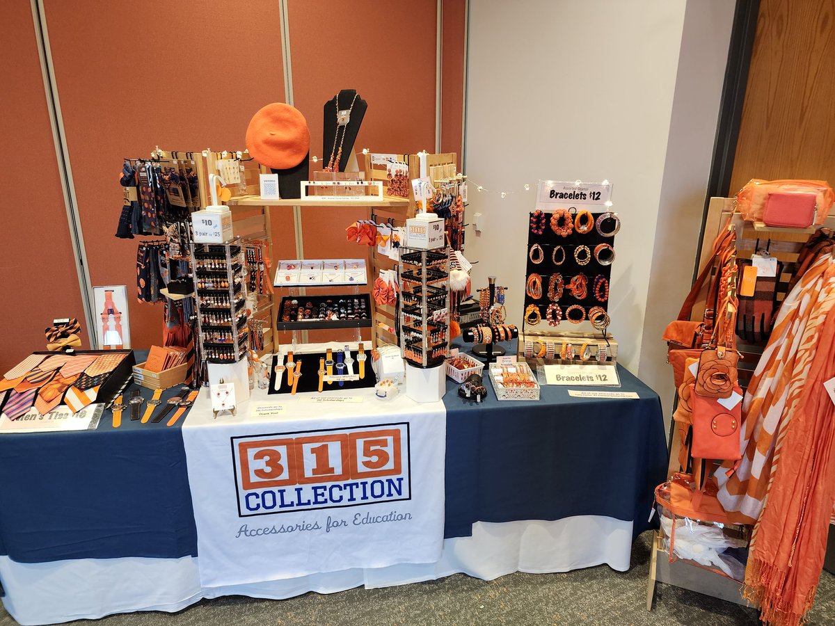 Come see us in the registration area at Orange Central!  Get some swag to complement your game-day look!