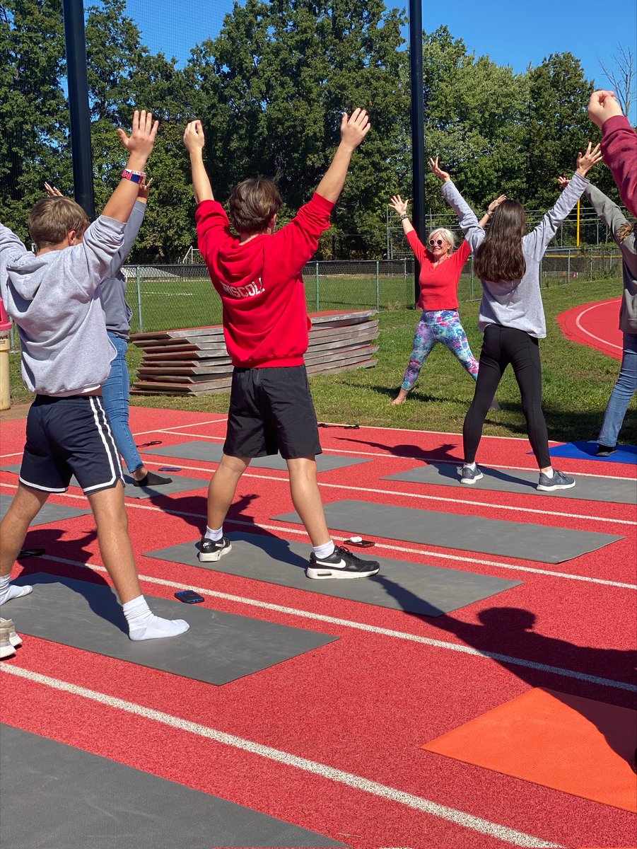 Beautiful day for outdoor yoga in Health class! #TZRISE