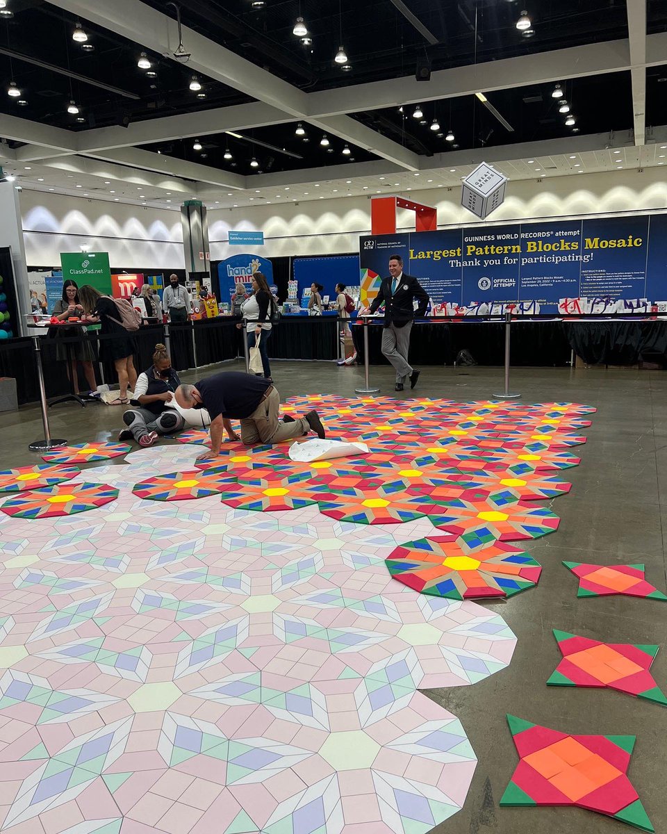 TalkMath2Me's tweet photo. We got to be a part of the Guinness Book of World Records for the largest #PatternBlock #Mosaic. @NCTM @GWR @GWRpress #GWR2023 #Math #Educators @RCOE_IS @RCOE #NCTMLA2022 https://t.co/YIgx1u458E