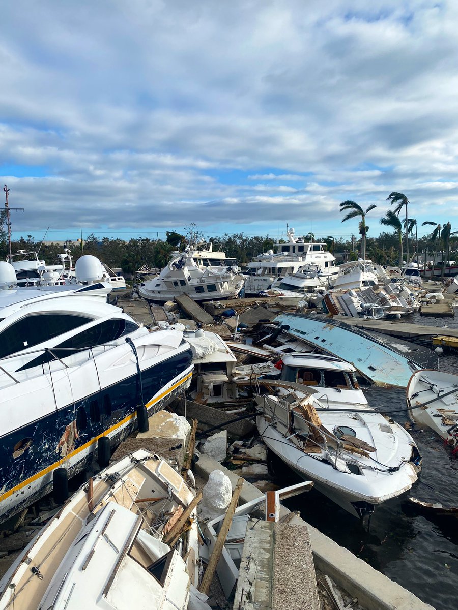 DylanFedericoWX's tweet photo. Ian’s catastrophic storm surge was so powerful it piled up every single boat on land in the downtown Fort Myers Marina. 🤯 #flwx #Ian https://t.co/FeDIWv7wlE