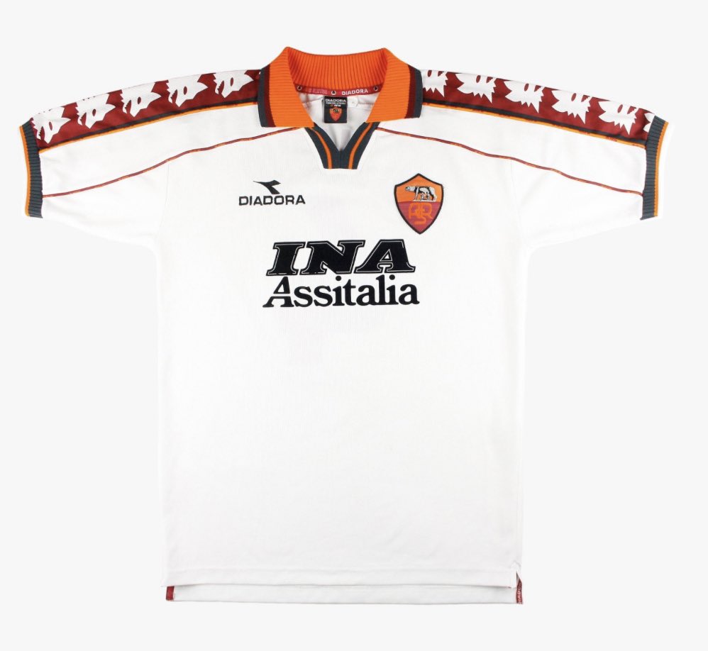 Kit_Rankings's tweet photo. It’s throwback kit Thursday! Todays gem of a kit is Roma’s away shirt from 1998-1999. I’m a huge fan of the bright collar, trim on the shoulders with the wolf graphics, and the subtle red line on the arm and side of the torso. Overall a 9.5/10. #Roma #ASRoma #Romakit https://t.co/FMJrV7VypS
