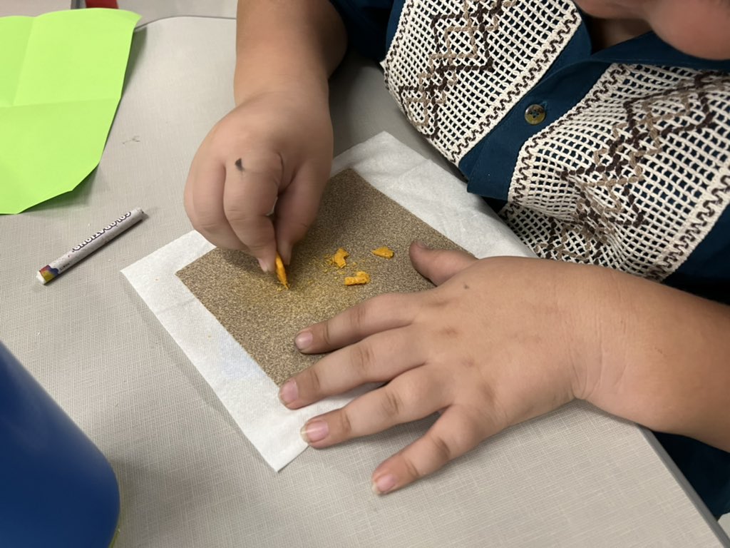 MissCress's tweet photo. My students using sand paper to sand crackers! They were working to see how the physical properties changed. https://t.co/iLHlMgWTte