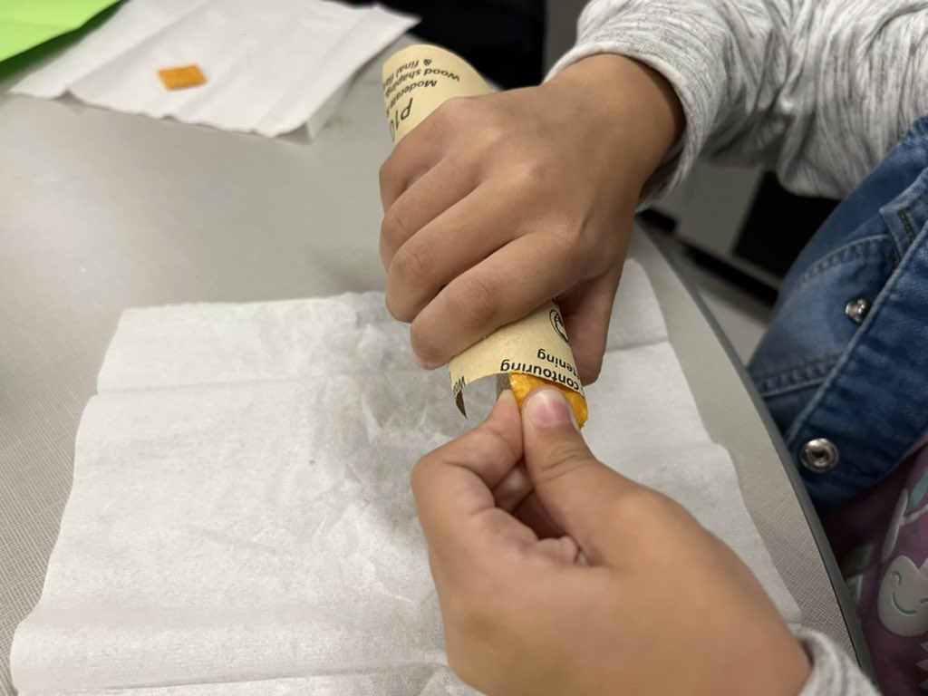 MissCress's tweet photo. My students using sand paper to sand crackers! They were working to see how the physical properties changed. https://t.co/iLHlMgWTte