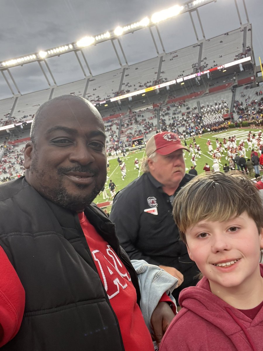 Bold_Leader864's tweet photo. Promise kept. I told him last summer I would take him to a @GamecockFB game he is a big fan but has never seen a game live.  Thanks mom for letting him ride with his old #PrinciPAL  Just b/c they leave your school you don’t leave them #MakingWaysNotExcuses #BOLDIsAChoice https://t.co/jVi344QWwB