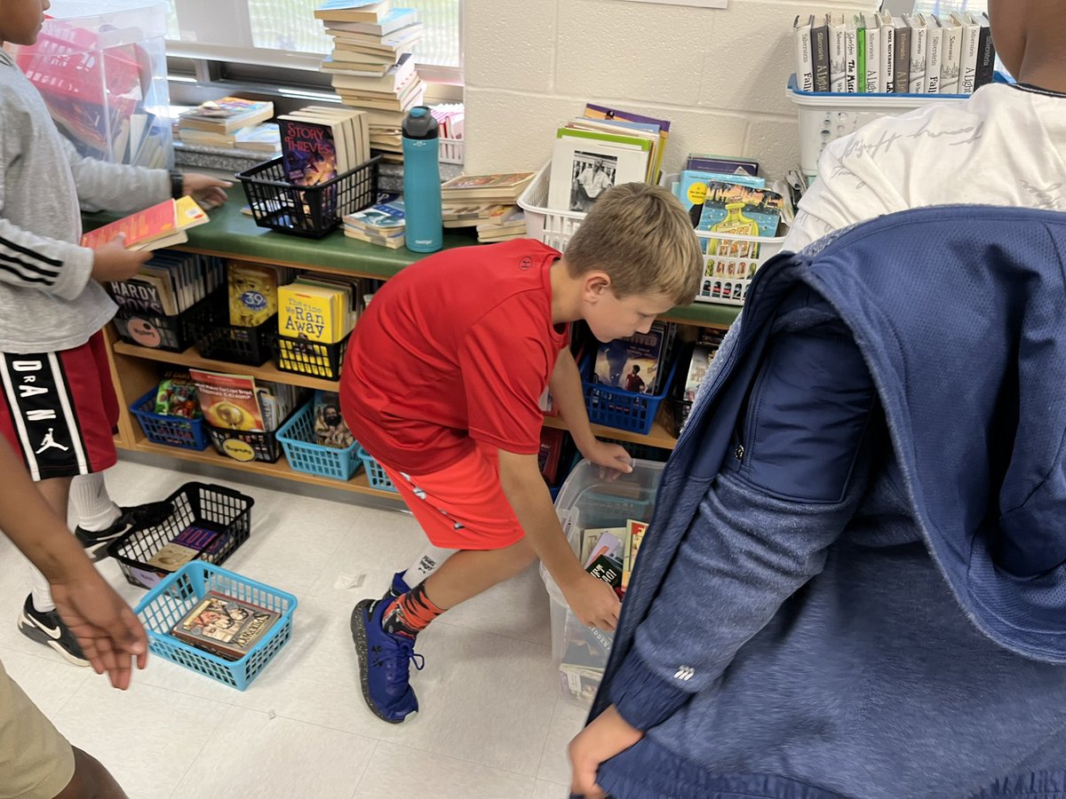 Student agency in our class means, that I as the teacher, steps back to allow Ss to organize the class library. Each of the volunteers collaborated to create a class library based on their criteria -genres. <a href="/GoshenPostES/">Goshen Post ES</a>