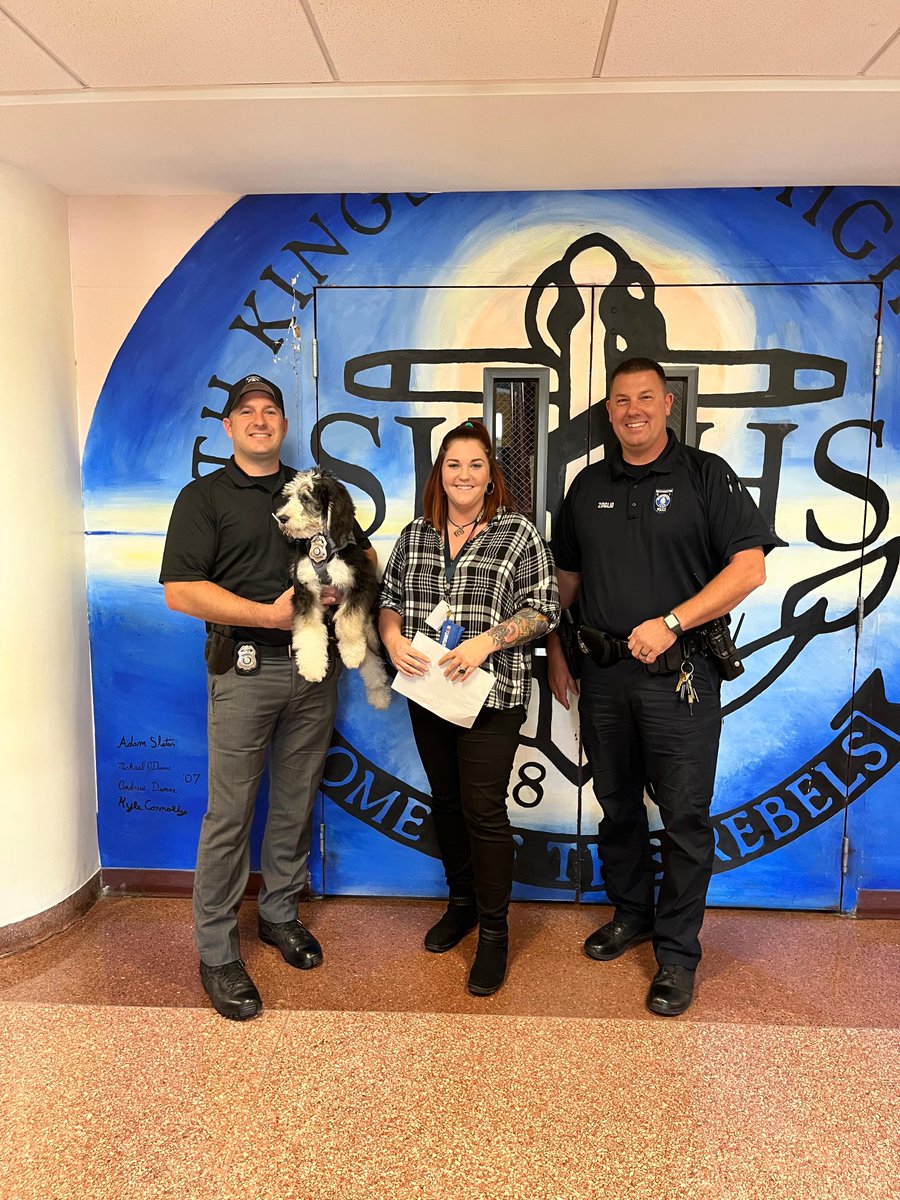 Leo had a great visit to South Kingstown High School today! As part of his on-the-job training he spent some time greeting students and met faculty members with Community Resource Officer Bryan Monte and School Resource Officer Anthony Zoglio. 🐾  #ServingSK.