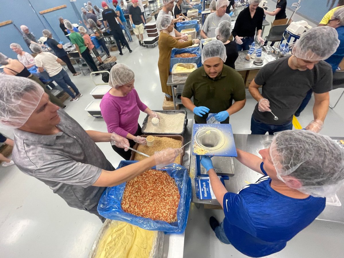 Last week, some staff members were able to come together and volunteer at Feed My Starving Children. Collectively, with a few other volunteer groups, we were able to pack enough meals to feed 76 individuals for a whole year!