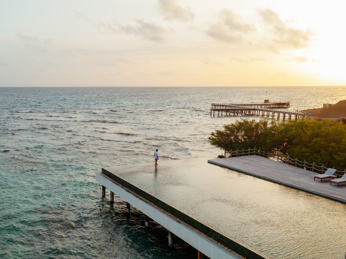 Something bright on the horizon — our view from the end of a day of #Maldives blue.